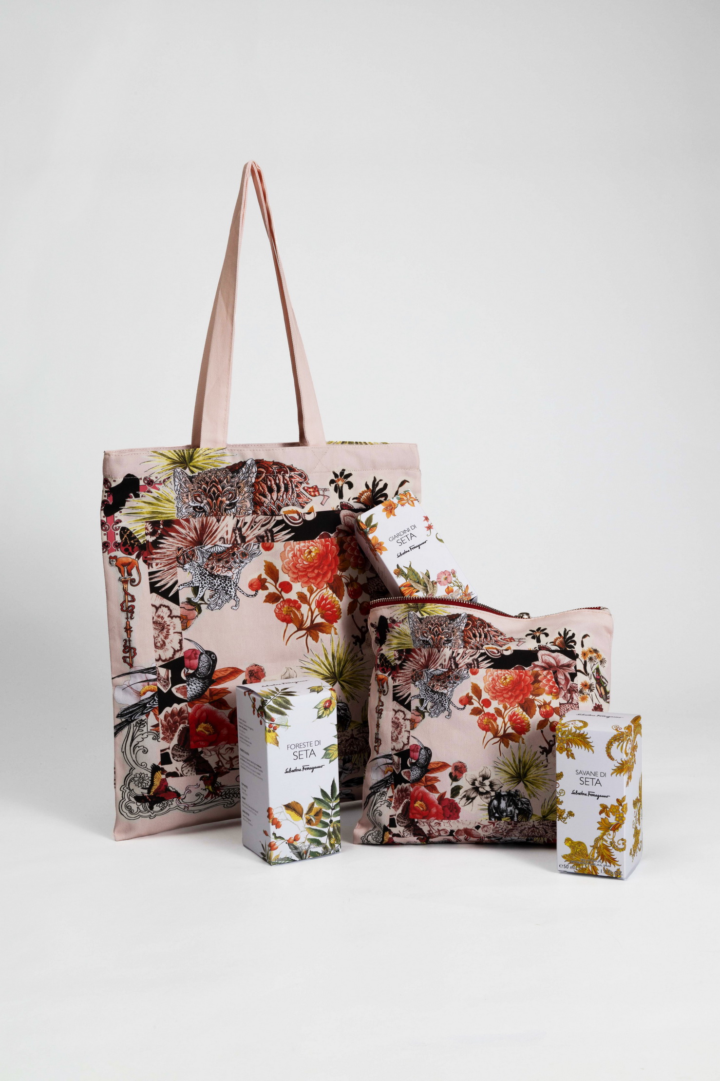 ferragamo patterned tote and pouch with perfume boxes